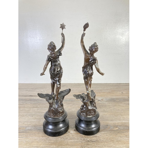 328 - A pair of vintage spelter figurines, one La Victoire and one La Travail - approx. 35cm high