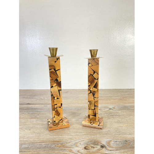 329 - A pair of mid 20th century Israeli olive wood and brass Shabbat candlesticks - approx. 26cm high