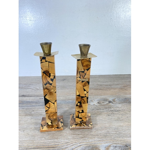 329 - A pair of mid 20th century Israeli olive wood and brass Shabbat candlesticks - approx. 26cm high