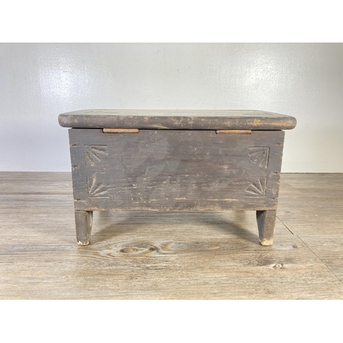 338 - A 17th century style stained pine miniature chest - approx. 21cm high x 36cm wide x 20cm deep