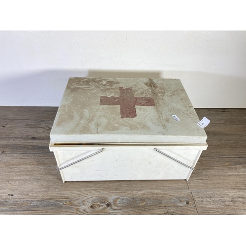 345 - A mid/late 20th century white plastic first aid box with contents - approx. 21cm high x 40cm wide x ... 