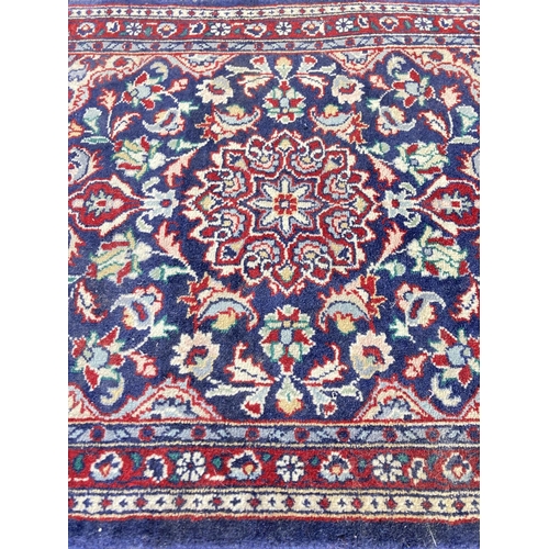 347 - A Pakistani 100% wool pile rug - 65cm x 48cm