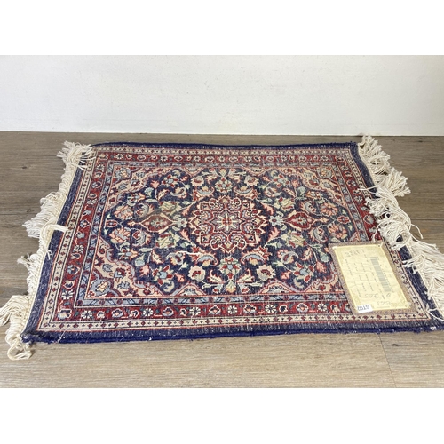 347 - A Pakistani 100% wool pile rug - 65cm x 48cm