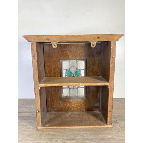 350F - An Arts & Crafts oak wall mountable cabinet with leaded and stained glass door - approx. 42cm high x... 