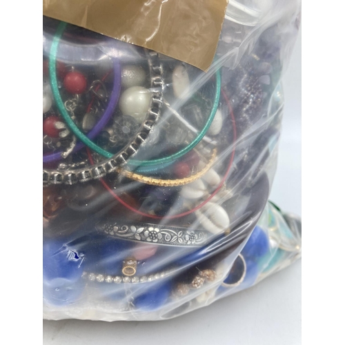 265 - Approx. 10kg of costume jewellery to include bangles, necklaces, rings, earrings etc.