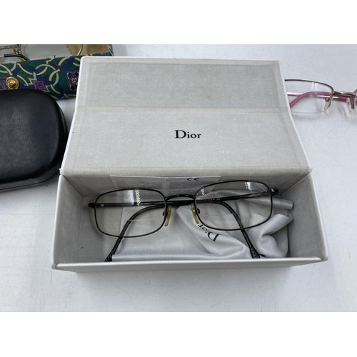 280 - A collection of assorted designer prescription glasses to include Gucci, Dior etc.