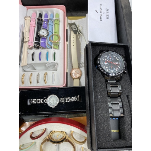 284 - A collection of assorted boxed wristwatches to include Emporio Armani, Hello Kitty, Lige, Michael Ko... 