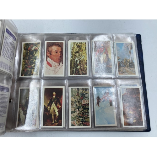 297 - A collection of vintage cigarette and tea cards to include An Album of Cricketers 1938 by John Playe... 