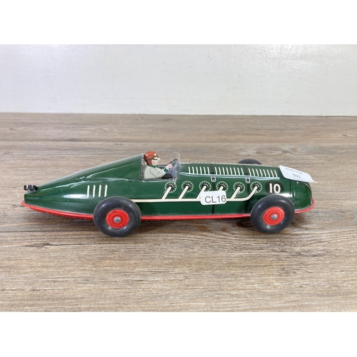 101 - A Schylling tinplate toy racing car - approx. 32cm long