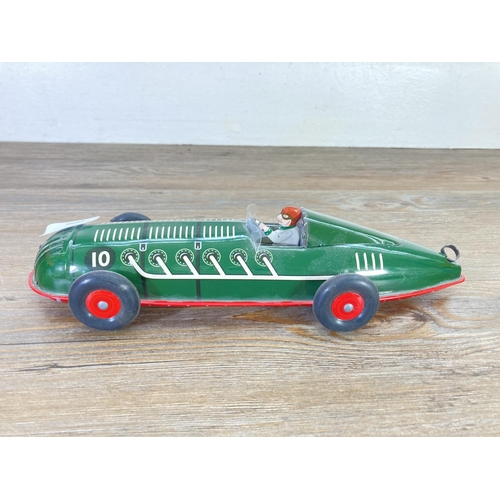 101 - A Schylling tinplate toy racing car - approx. 32cm long