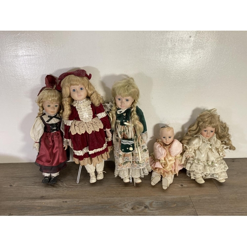 112 - Six vintage porcelain dolls to include Armand Marseille 990 etc.