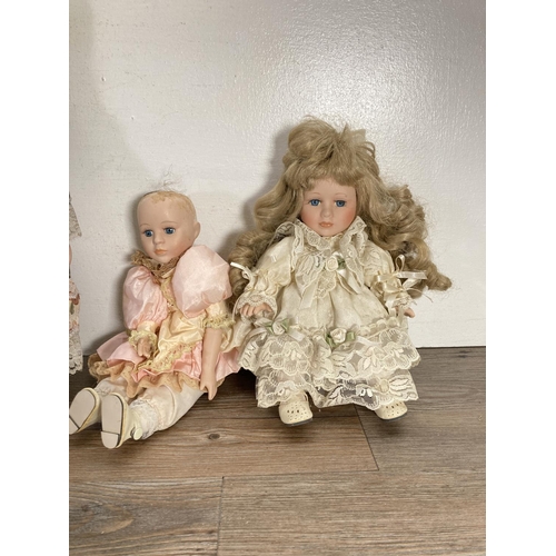 112 - Six vintage porcelain dolls to include Armand Marseille 990 etc.