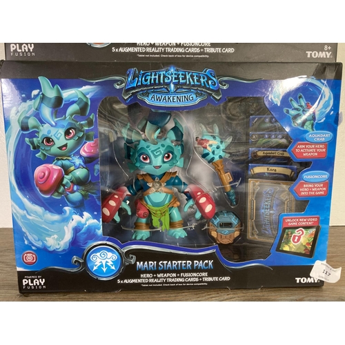 117 - Two boxed Tomy Lightseekers Awakening starter packs