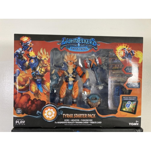 117 - Two boxed Tomy Lightseekers Awakening starter packs