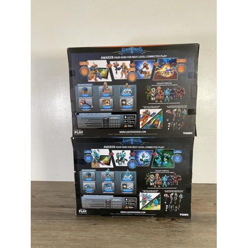 117 - Two boxed Tomy Lightseekers Awakening starter packs