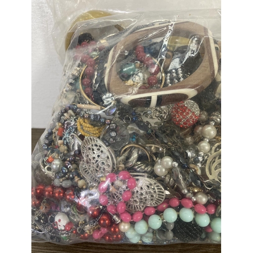 129 - Approx. 2.4kg of costume jewellery