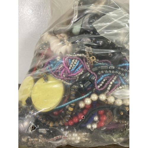 146 - Approx. 10kg of costume jewellery to include bangles, necklaces, rings, earrings etc.