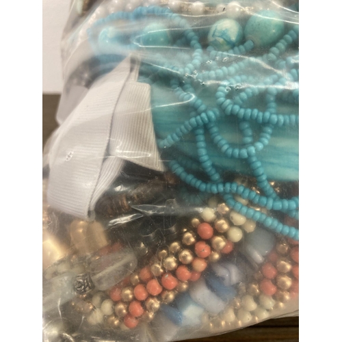 152 - Approx. 10kg of costume jewellery to include bangles, necklaces, rings, earrings etc.