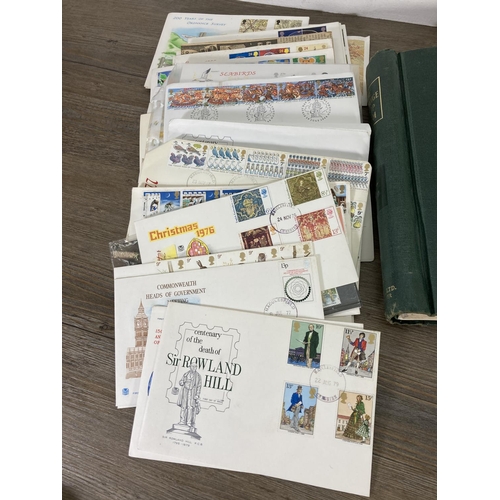 168 - A large collection of First Day Covers to include British Film Greats, Royal National Rose Society, ... 