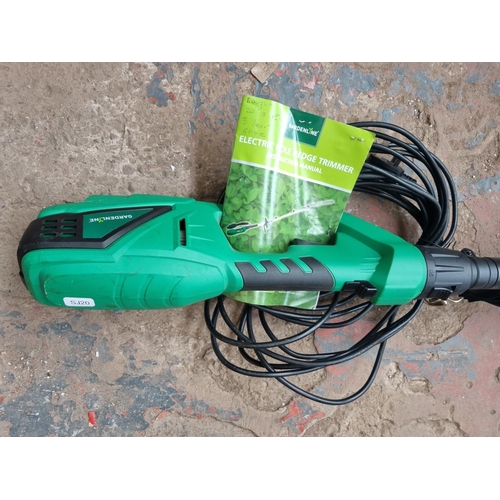 619 - A Gardenline electric pole hedge trimmer