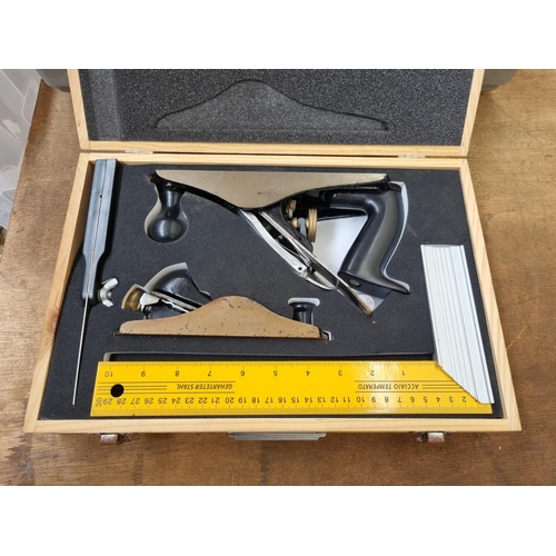 625 - A boxed two piece wood plane set with accessories