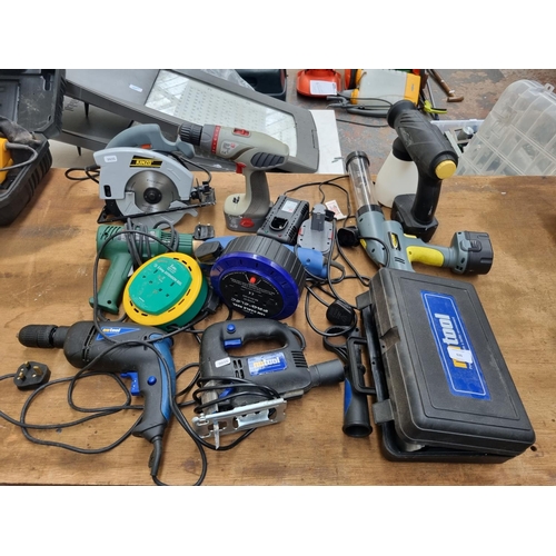 626 - A quantity of assorted power tools to include Nutool belt sander, Nutool jig saw, Kinzo circular saw... 