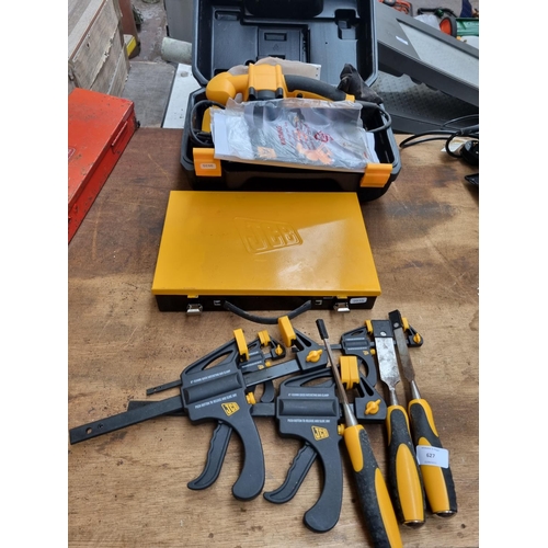 627 - A quantity of JCB hand and power tools to comprising boxed belt sander - model no. JCB D-BS900F, dri... 