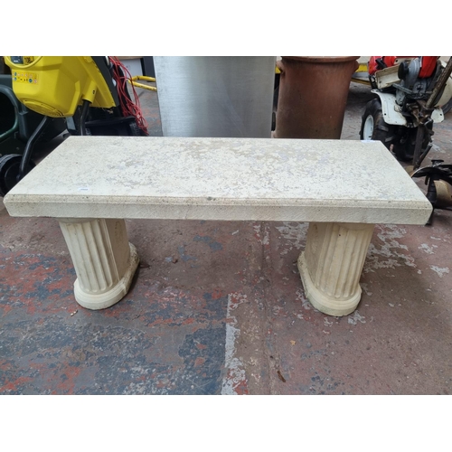 656 - A cast stone rectangular garden bench on Corinthian supports - approx. 43cm high x 95cm long x 36cm ... 