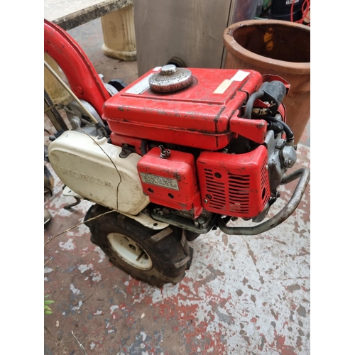 657 - A Honda G25 petrol rotovator