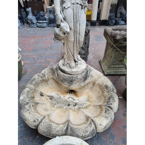 660 - A cast stone garden clamshell and classical lady  birdbath - approx. 102cm high