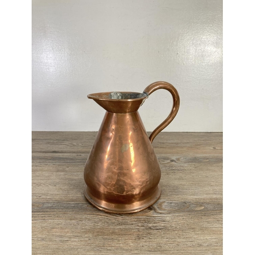 100 - Seven pieces of brass and copperware to include late 19th century Dutch milk jug, Victorian kettle, ... 