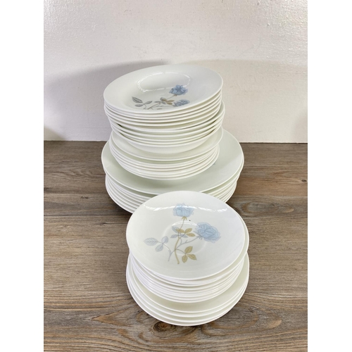 57 - A collection of Wedgwood Ice Rose china to include two tureens, four cups, gravy boat, meat plate et... 