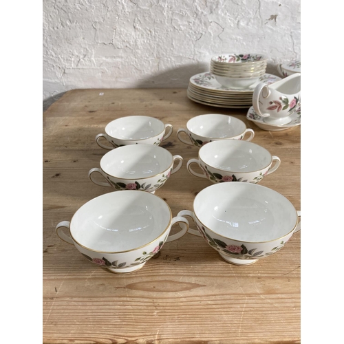 58 - A collection of Wedgwood Hathaway Rose china to include six coffee cans, six saucers, six side plate... 