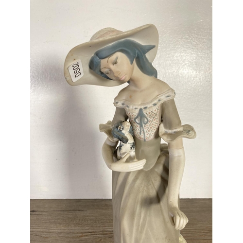 65 - Two porcelain lady figurines - largest approx. 39cm high