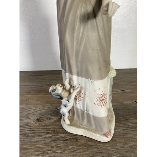 65 - Two porcelain lady figurines - largest approx. 39cm high