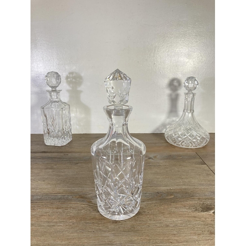 74 - Three vintage cut glass decanters to include Royal Doulton etc.