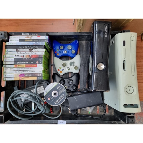 Two Xbox 360 games consoles with accessories and games to include Call ...