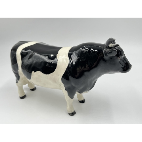 24 - A Beswick CH Coddington Hilt Bar Friesian bull figurine - model no. 1439A