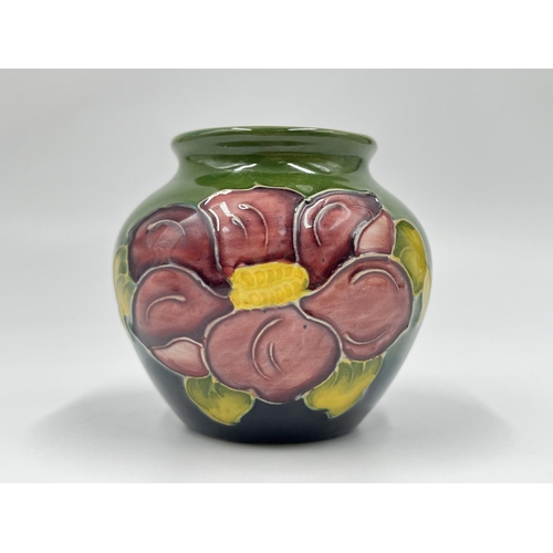 31 - A Moorcroft Pottery Clematis pattern vase - approx. 7.5cm high