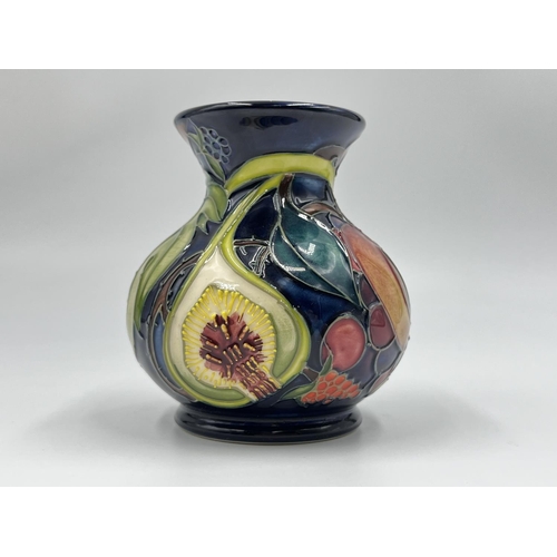 32 - A Moorcroft Pottery Queen's Choice vase by Emma Bossons - approx. 9.5cm high
