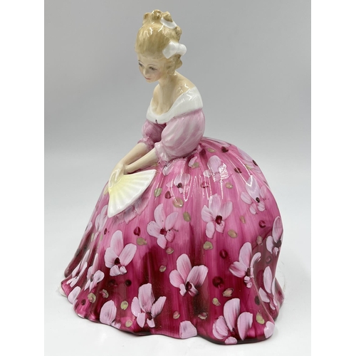37 - A Royal Doulton 'Victoria' figurine - HN2471
