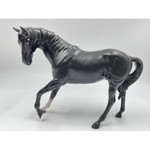 6 - A Beswick matte black horse figurine