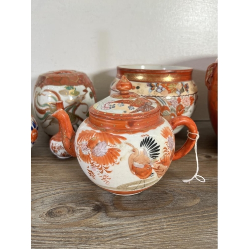 54A - A collection of oriental ceramics to include Imari 20cm bottle neck vase, table lamp etc.