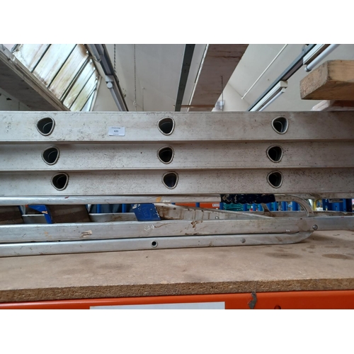 620 - Two aluminium ladders, one Abru seven tread step ladder and one three section extending