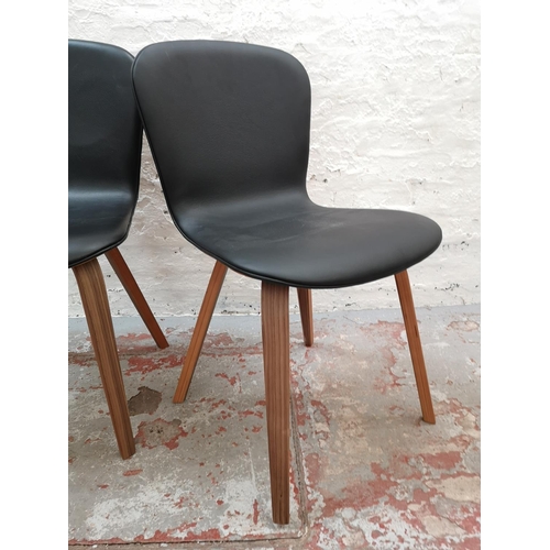 249 - A pair of John Lewis Kasper leather and walnut effect dining chairs