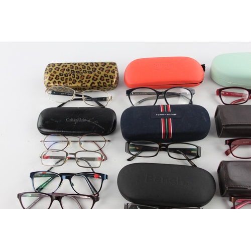 126 - A large collection of branded spectacles to include Hugo Boss, Calvin Klein, FCUK etc.