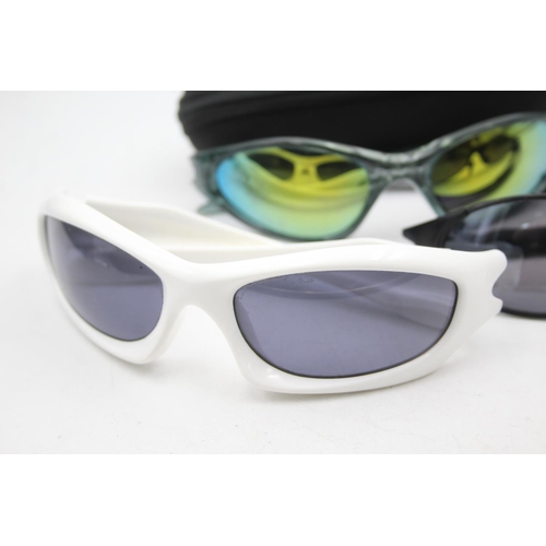 128 - Three pairs of Oakley sunglasses to include Minute, Y2K etc.