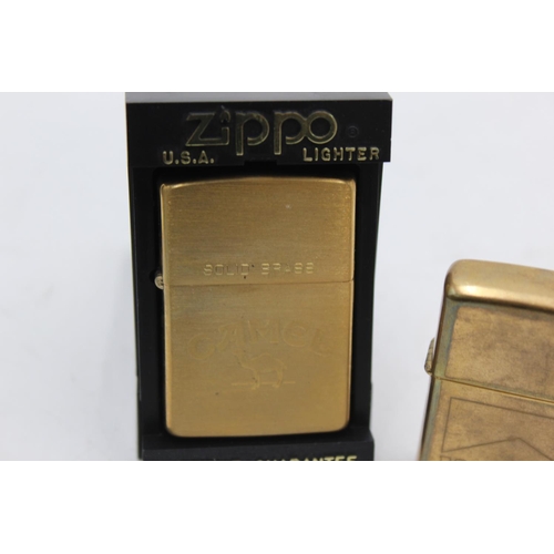 Four Zippo cigarette lighters to include Jack Daniels, Marlboro etc.