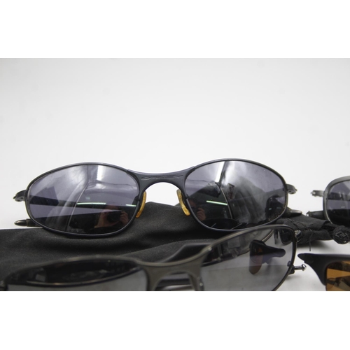 132 - Four pairs of Oakley sunglasses