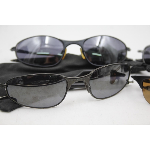 132 - Four pairs of Oakley sunglasses